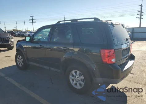 2010 Mazda Tribute I z USA, uszkodzony, nr VIN 4F2CY0C70AKM02556
